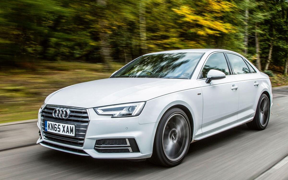 White Audi A4 sedan on the road